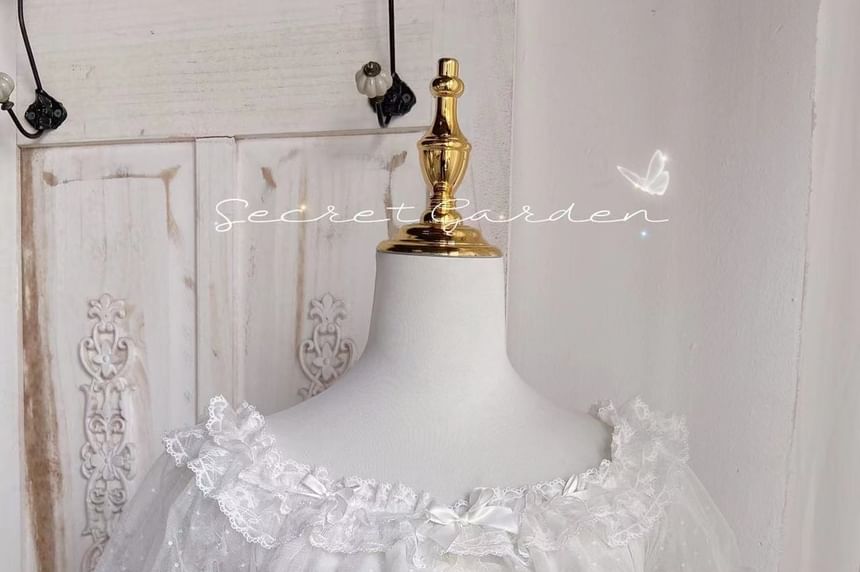 Short-Sleeve Boat Neck Bow Lace Trim Peplum Cropped Blouse