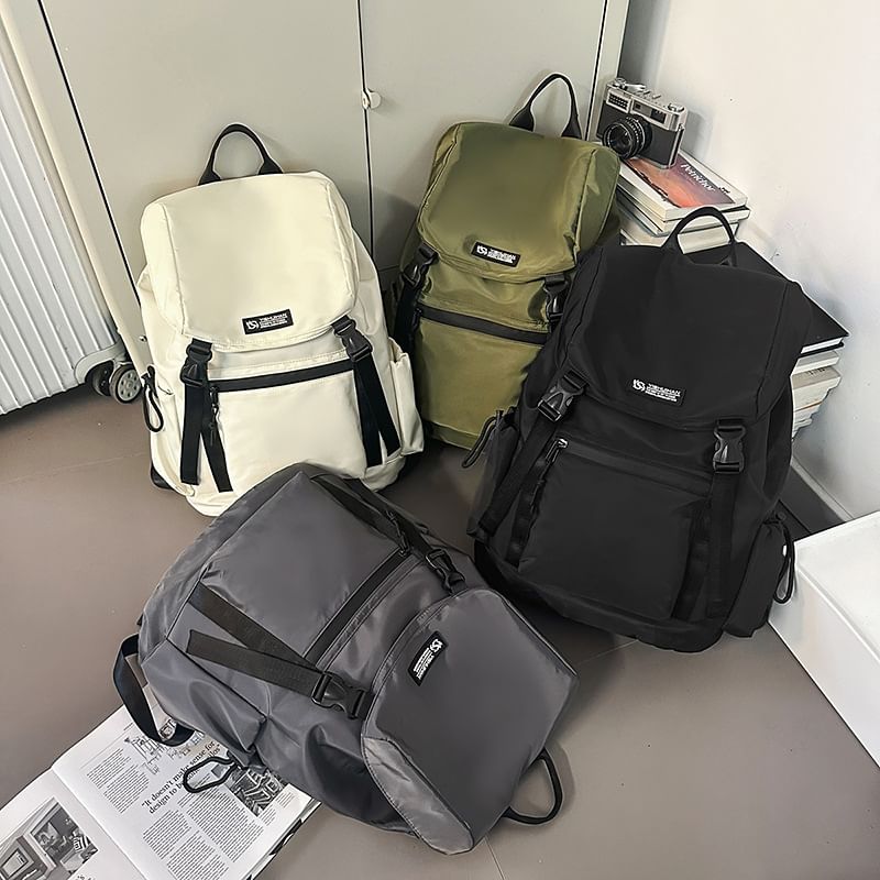 Backpack Buckled Flap Lettering