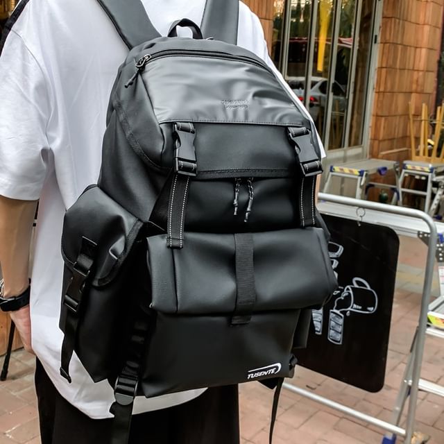 Lettering Buckled Leather Backpack Faux