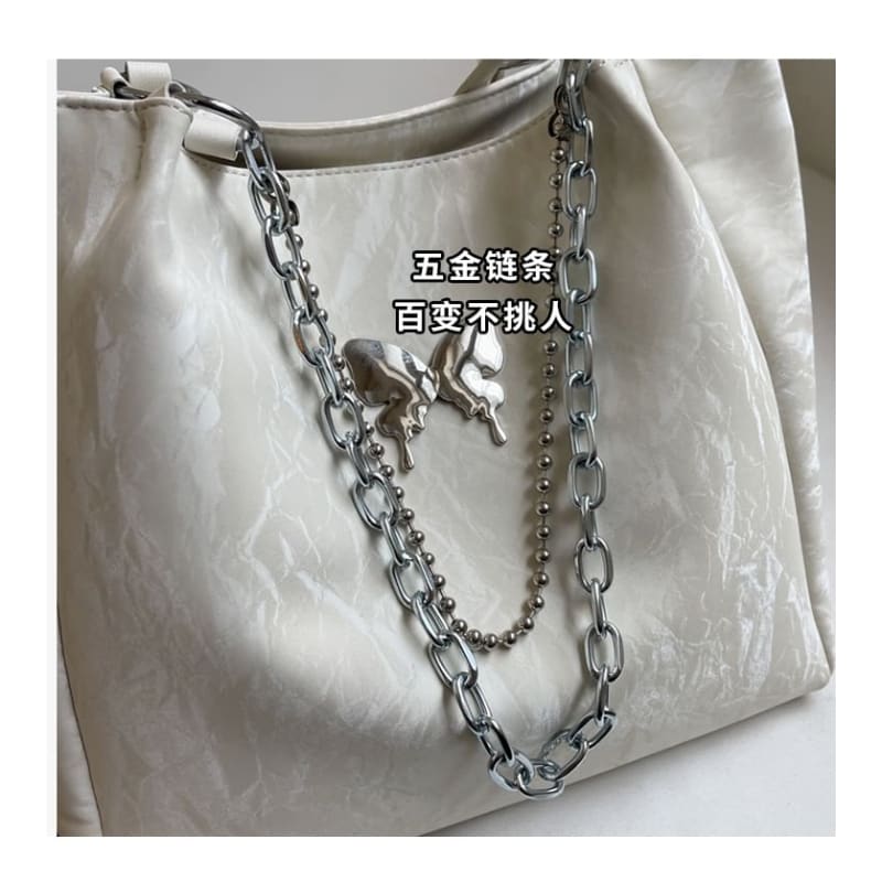 Butterfly Accent Chained Faux Leather Tote Bag