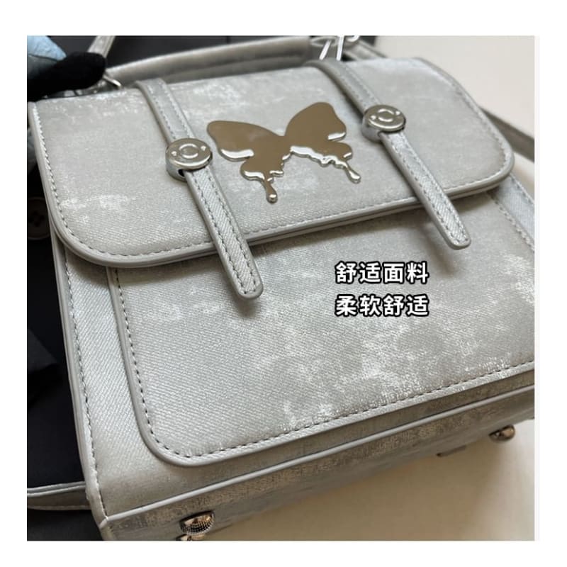 Butterfly Studded Flap Backpack