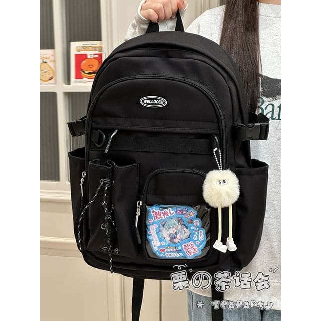 Canvas Zip Backpack - With Pom Pom Charm - Black / One Size