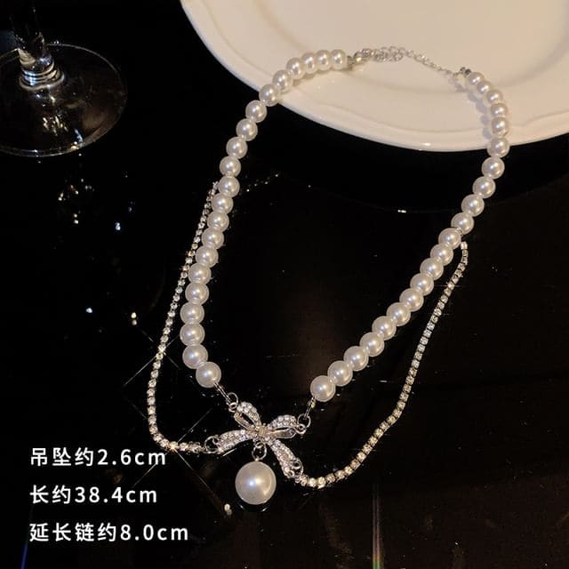 Faux Pearl Pendant Bow Rhinestone Necklace - 02 - GN1570