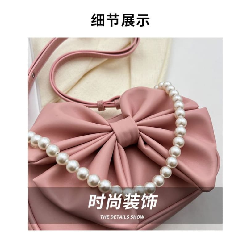 Faux Pearl Strap Bow Crossbody Bag