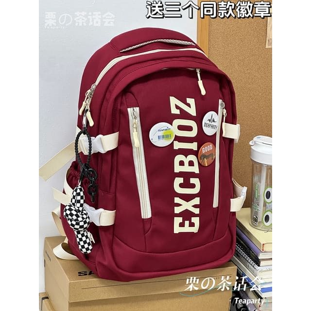 Lettering Print Buckle Backpack - With Checker Knot Charm