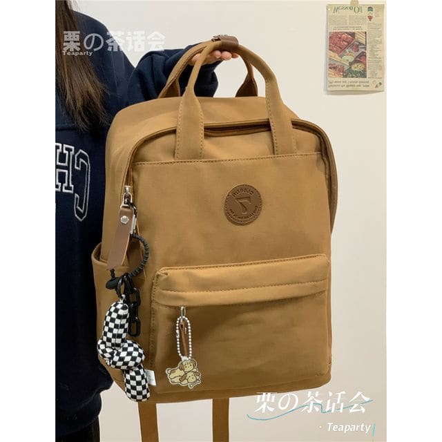 Plain Canvas Laptop Backpack - With Kink Charm - Caramel