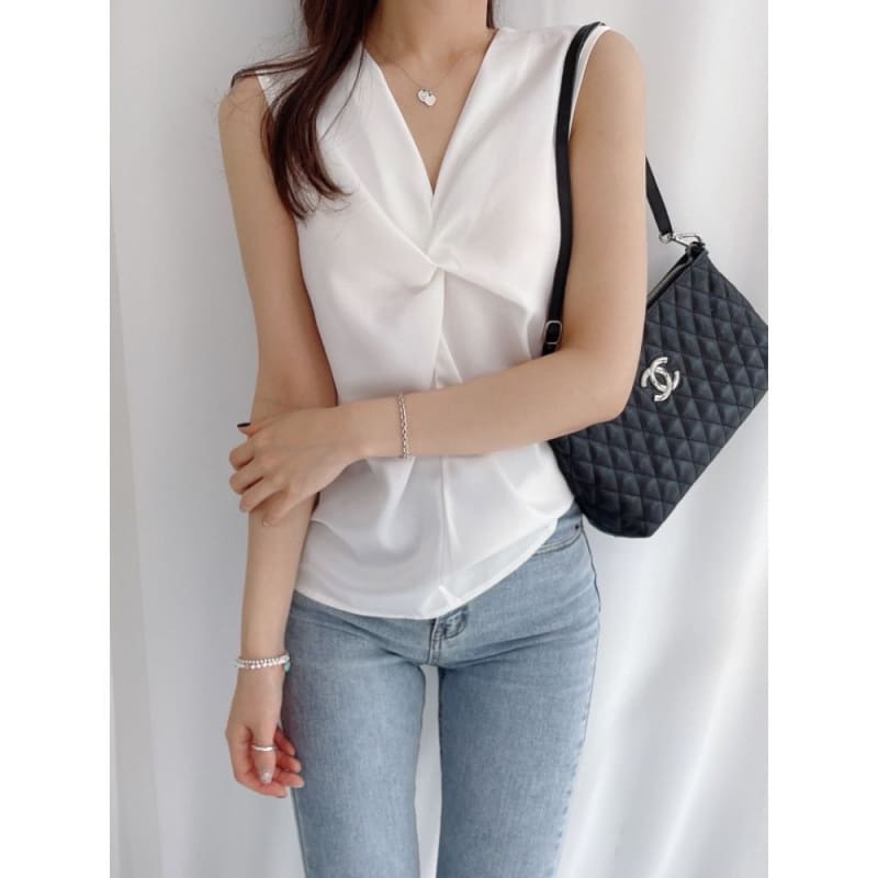 Sleeveless V-Neck Plain Twist Blouse