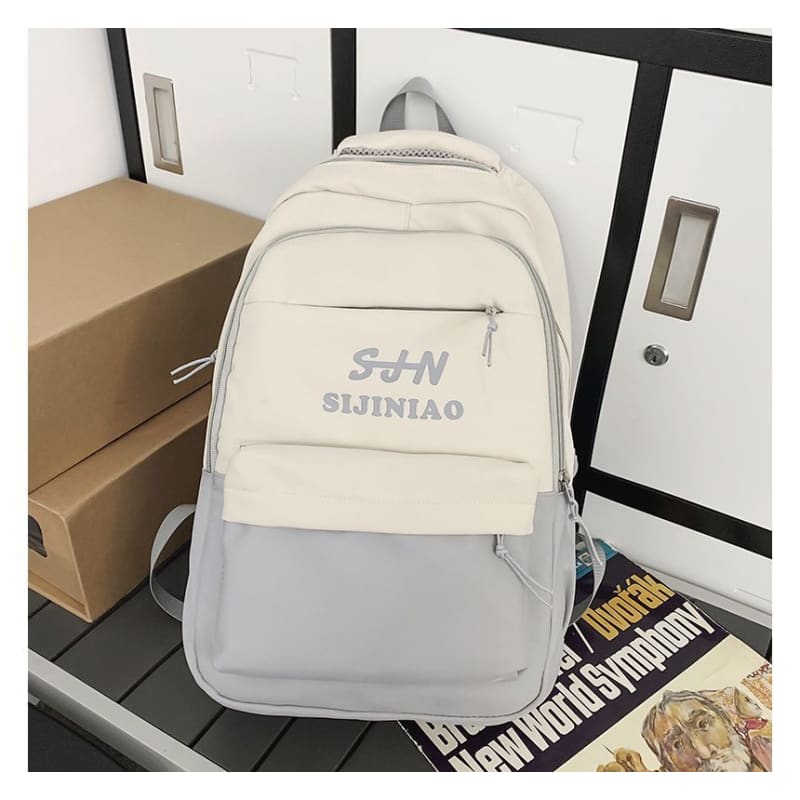 Two Tone Lettering Zip Backpack